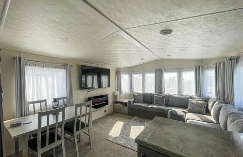 Felixstowe House | Beautiful caravan with free WiFi and decking at Suffolk Sands Park ref 45083C