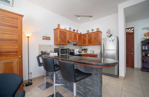 Cerro Plano Condo | Beautiful Condo Garden and Pool Views, a few Steps From Jaco Beach