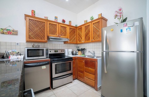 Cerro Plano Condo | Beautiful Condo Garden and Pool Views, a few Steps From Jaco Beach