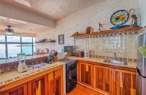 Akumal Condo | Beautiful condo with ocean view, shared pools and amazing views!
