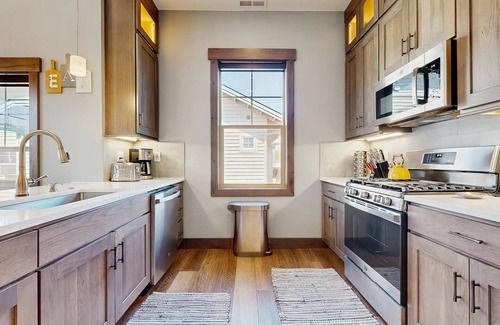 Dover Bay Condo | Beautiful condo with river views, deck, BBQ, WiFi, and nearby activities