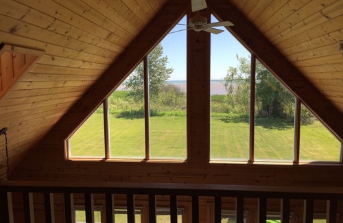 Hessel House | Beautiful Cottage on St. Martins Bay, Lake Huron, with Pontoon, Kayaks & Canoe!