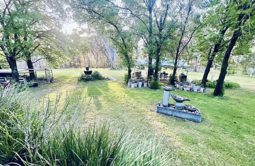Coonabarabran House | BEAUTIFUL COUNTRY RETREAT with spacious gardens, hot tub, wood fire & much more!
