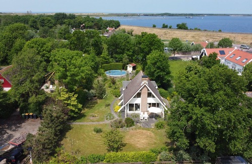 Scharendijke House | Beautiful detached bungalow with private pool and a large,