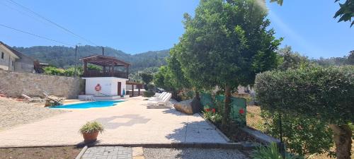 Amares Villa | Beautiful detached villa with private pool, Fibre Wi-fi, garden, games room & BBQ