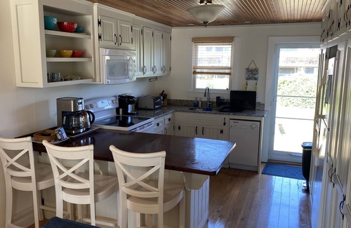 West Dennis House | BEAUTIFUL DUPLEX COTTAGE with OCEAN VIEWS of PRIVATE BEACH -