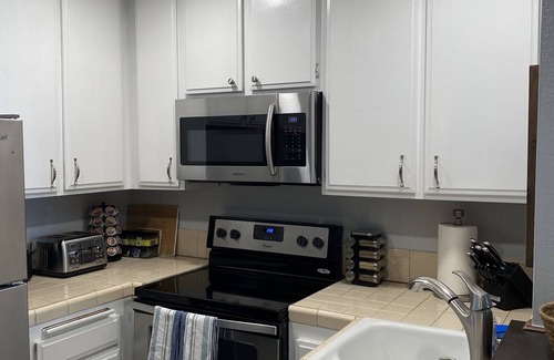 Oceanside Condo | Beautiful End Unit Single Level Condo North Coast Village - Walk to the beach!