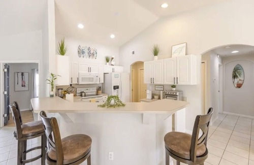 Pelican House | Beautiful family friendly, centrally located heated pool home in Cape Coral, FL