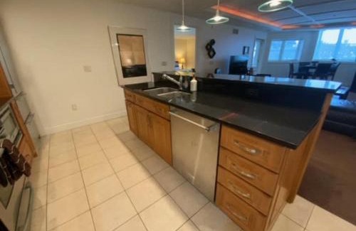 Traverse City House | Beautiful First Floor suite with patio to the Bay