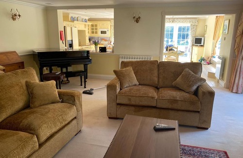 Village de Putron House | Beautiful five bedroomed family home in Guernsey with heated pool