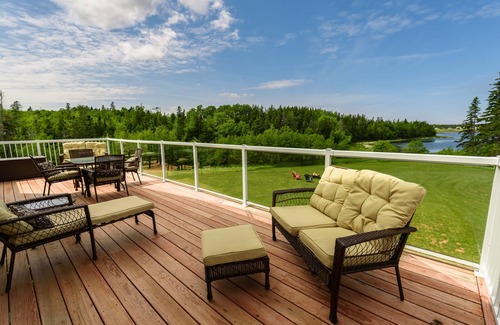 Stanley Bridge House | Beautiful four bedroom home with waterview, outdoor hot tub, and fire pit