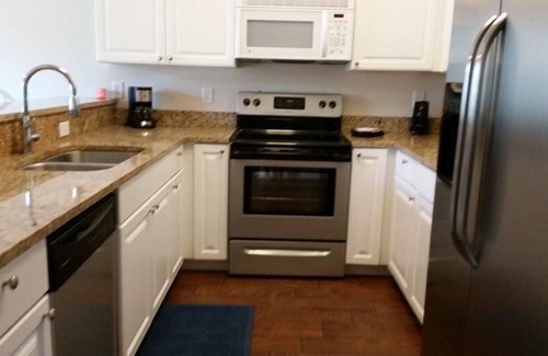 Gulf Shores Condo | Beautiful Furnished In the Courtyard, Right Beside The Pool On 1st Floor