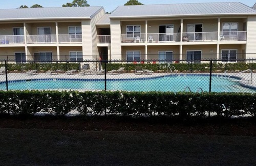 Gulf Shores Condo | Beautiful Furnished In the Courtyard, Right Beside The Pool On 1st Floor