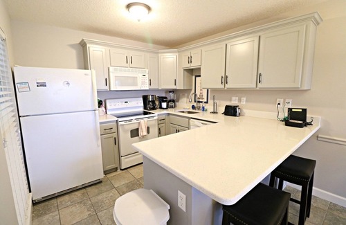 Crescent Beach Apartment | Beautiful, Ground Floor, Just Steps From the Pool & Beach! Also has Boat Ramp