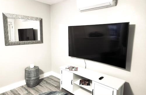 Bluff Heights Apartment | Beautiful Guesthouse, Sleeps 4 - Kitchen, Private Laundry, AC, Parking, 65' TV, Close to Stores, Restaurants & Beach