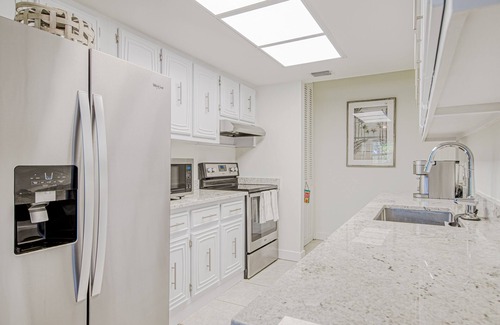 Juno Beach House | Beautiful home across street from beach path with AC, patio & washer/dryer