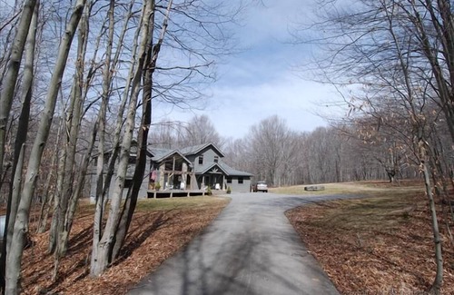 Old Timberline House | Beautiful home offers a large yard, generous deck and convenient location.