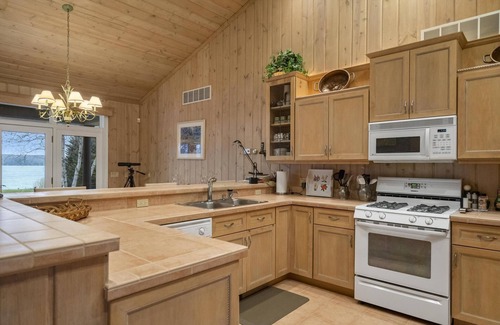 Walloon Lake House | Beautiful Home on Walloon Lake - Private Frontage and Expansive Yard!