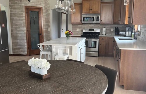 Neenah House | Beautiful home Sleeps 10 with Heated Inground Pool