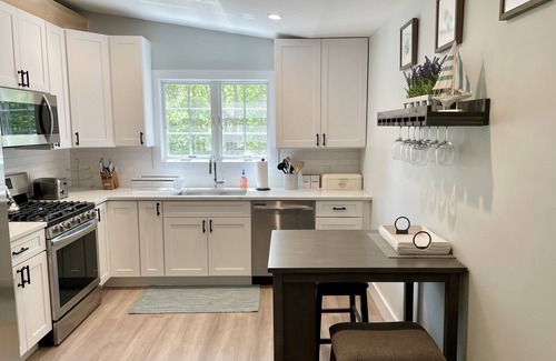 Springs House | Beautiful Home with walking distance to the beach, new 46ft pool! EV charger