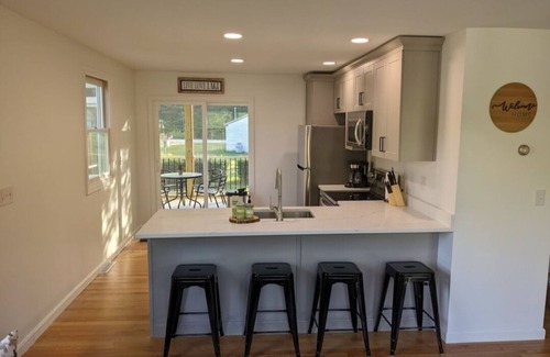 Raymond House | Beautiful home with 150ft sandy beach and private boat launch on Big Sebago!