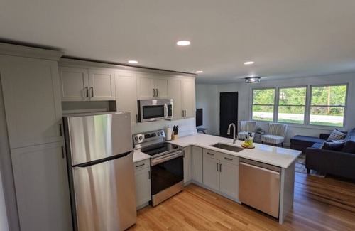Raymond House | Beautiful home with 150ft sandy beach and private boat launch on Big Sebago!