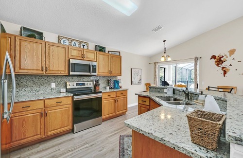 Cumbrian Lakes House | Beautiful home with a private pool. Close to Disney and pet friendly.