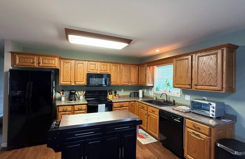 Denver House | Beautiful KY Lake house in Big Sandy, TN-private dock, water slide, game room