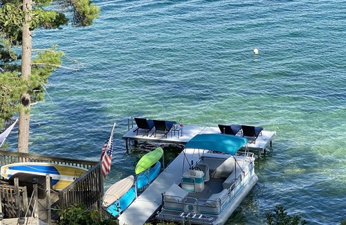 Kalkaska House | Beautiful Lake Front Year Round Family Cottage on Crystal Clear Bear Lake.