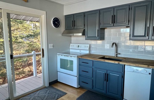 Mears Cottage | Beautiful lakefront cottage within minutes of sand dunes and Lake Michigan