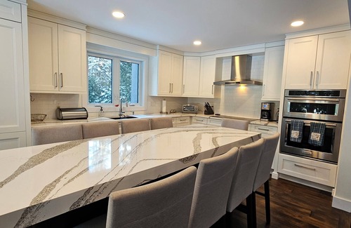 Feronia House | Beautiful lakefront home on Trout Lake! Hot tub and movie room included!