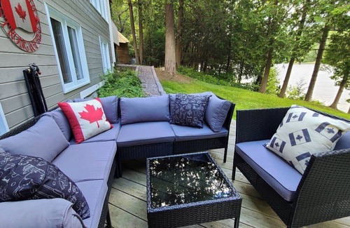 Feronia House | Beautiful lakefront home on Trout Lake! Hot tub and movie room included!