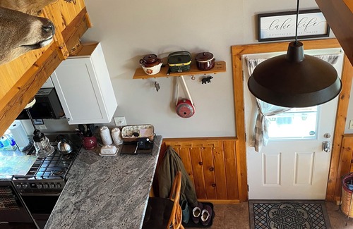 Greenville House | Beautiful lakefront camp with sunset view over big moose mountain