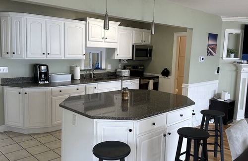 Onsted House | Beautiful lakehouse directly on all sports lake. Stunning views!58ft frontage.