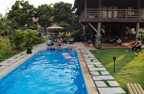 Ban Tak House | Beautiful large garden teak property right on the river in Bantak village.n