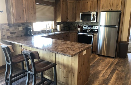 Ashton Apartment | Beautiful loft apartment overlooking the Henry’s Fork River at the Ora Bridge!