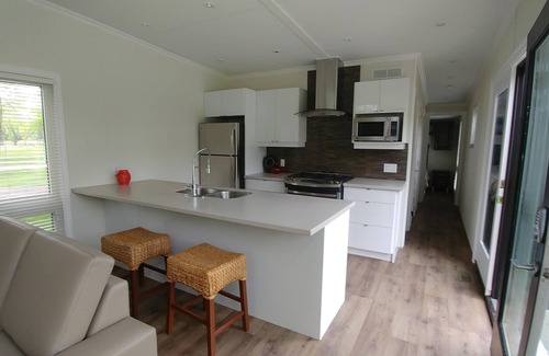 Pointe aux Roches Cottage | Beautiful modern cottage for rent located on a golf course