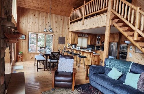 Webster House | Beautiful, modern log cabin on a great swimming and fishing lake with privacy!