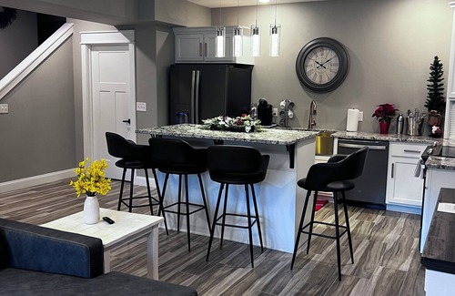 Joplin Villa | Beautiful Modern mountain getaway overlooking water with fountain.