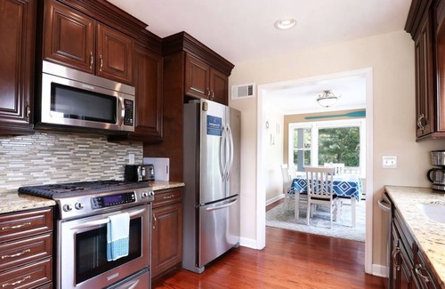 Fox Lake House | Beautiful Nautical 4/3 Waterfront with Bonus Apartment, Hot Tub, and Large Deck