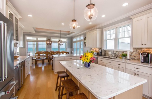 Ocean Isle Beach House | Beautiful new Custom Oceanfront home with XL covered decks, pool and elevator.