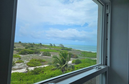 Wheeland Settlement Condo | Beautiful Ocean View 3 Bedroom Condo on the Beach