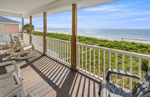 Cherry Grove Beach Apartment | Beautiful oceanfront balcony at this pet-friendly, cozy apartment steps from the sand