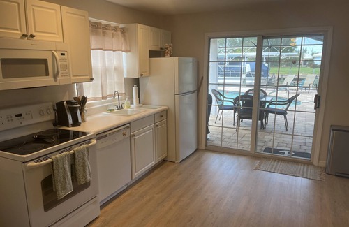 Bokeelia Apartment | Beautiful pool home on canal with 45-foot boat dock. 10 minutes to Gulf by boat.