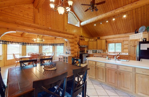 San Juan River Village Cabin | Beautiful Riverfront Log Cabin with Mountain Views, Firepit, and Gas Grill