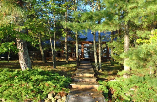 Hayward House | Beautiful round lake northern cedar modern vacation home
