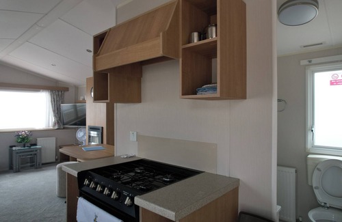 Kinmel Bay Cabin | Beautiful sea front lodge with stunning sea views