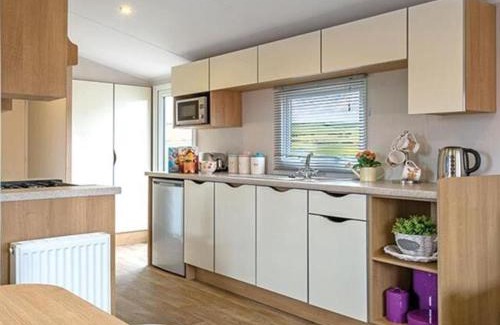 Kinmel Bay House | Beautiful sea front lodge with stunning sea views