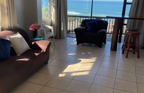 Warner Beach Cottage | Beautiful sea view from wooden balcony with sunrises to die for !