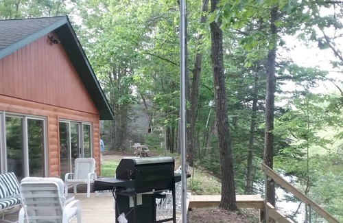 Evart Cabin | Beautiful, Secluded Muskegon Riverfront Cabin